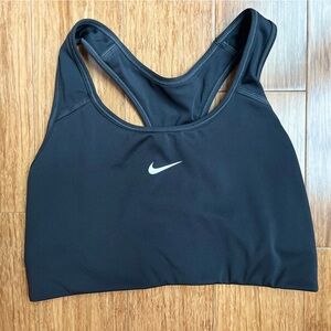 Nike women’s  Black Sports Bra size medium. 1410